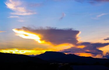 Silhouette mountain , landscape skyline clouds sunset sky in the evening