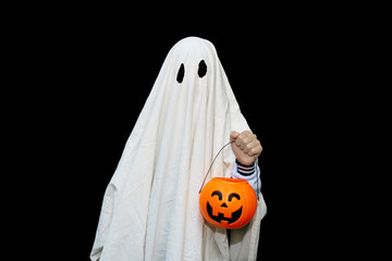 Halloween ghost costume with a basket of pumpkin. Isolated on black background.