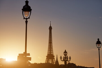 Fototapeta na wymiar Cityscape of Paris, France and famous landmark Eiffel tower in silhouette just before sunset.