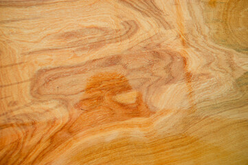 The background image of the plank made of varnish, giving a clear reflection.