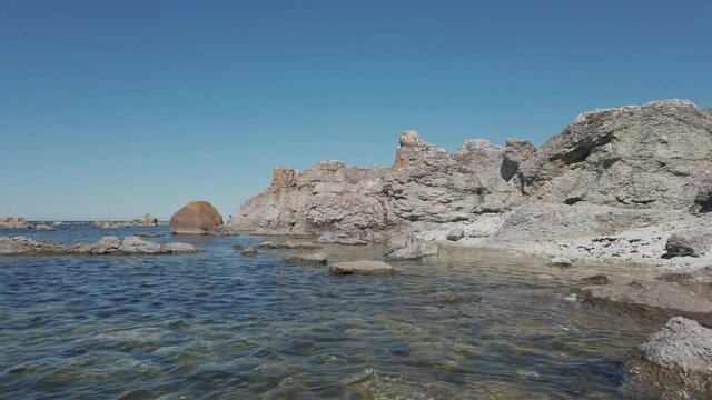 Rauks at Gotland in sunny day. Pan left
