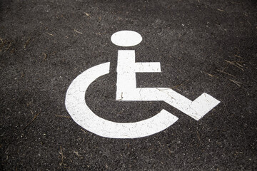 Disabled sign on the asphalt