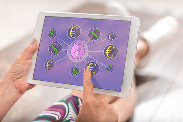 Money saving concept on a tablet