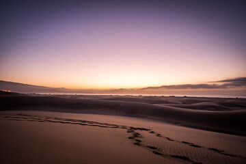 Naklejka na ściany i meble Spectacular Sunrise Sandy dunes in famous natural Maspalomas beach. Gran Canaria. Spain