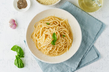Cacio e pepe pasta. Spaghetti with parmesan cheese and pepper. Traditional italian cuisine. Top...