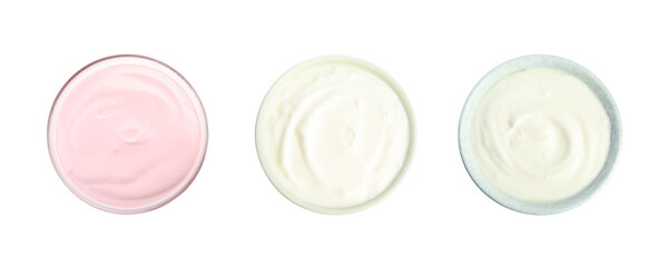 Set of delicious natural yogurts in bowls on white background, top view. Banner design