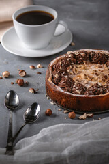 Homemade pie with nuts and chocolate ganache