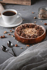 Homemade pie with nuts and chocolate ganache