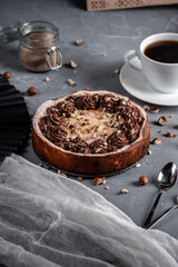 Homemade pie with nuts and chocolate ganache