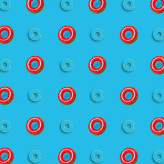 Many inflatable rings on color background