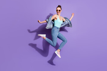 Full length body size view of nice attractive lovely slim fit thin funny girlish cheerful girl jumping having fun enjoying isolated on bright vivid shine vibrant lilac purple violet color background