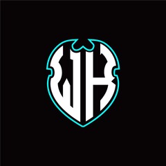 W K Initial logo design with a shield shape