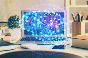 Double exposure of work space with computer and human brain drawing hologram. Brainstorm concept.