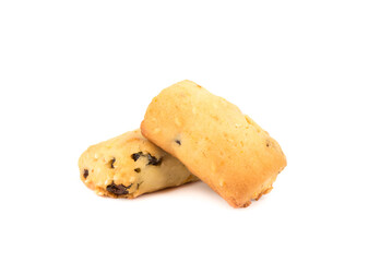 Two freshly baked homemade cookies with raisins isolated on a white background.