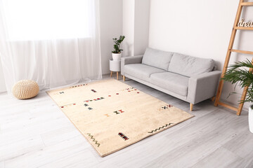 Interior of modern room with soft carpet