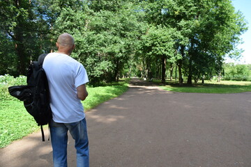 senior man walking in park