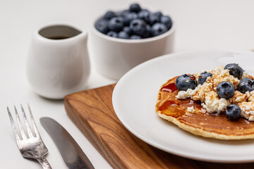 
Tasty breakfast. Pancakes with fresh blueberries.