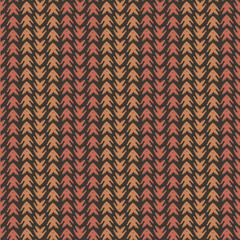Vector tribal arrow style grunge seamless pattern background. Painterly chevrons in vertical brown and terracotta alternating rows Dense wicker weave effect all over print for fabric, packaging