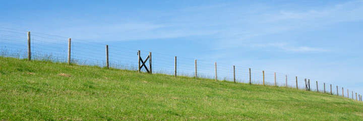 Zaun am Deich, Krummh&ouml;rn, Ostfriesland, Niedersachsen, Deutschland