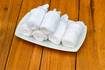 Cold towels, welcome in the hotel. Wet welcoming refreshing towels at the eastern restaurant....