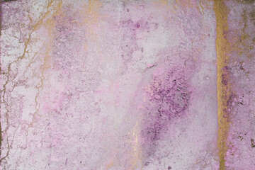 Pastel pink grunge texture. Pink cracks. Gold splashes