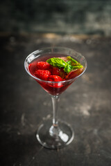 Raspberry martini cocktail. Selective focus. Shallow depth of field. 