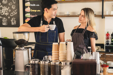 Happy young man and woman developing own coffee business.