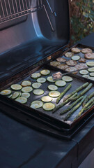 Hand holding tongs to move food