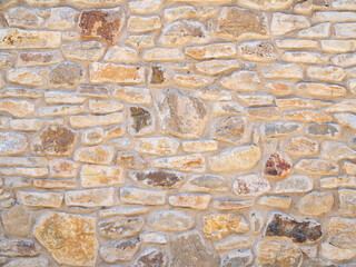 Real antique spanish rubble wall background texture