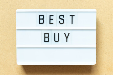 Lightbox with word best buy on wood background
