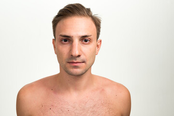 Fototapeta premium Portrait of man with blond hair shirtless