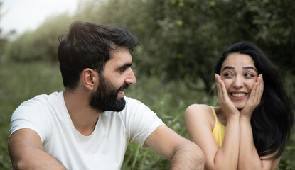 Obraz premium happy woman and man in the garden
