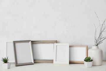 Photo frames on table in room