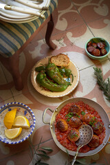 Selection of Spanish tapas on a tiled floor