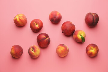 Many ripe peaches on color background