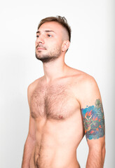 Naklejka premium Portrait of bearded man with blond hair shirtless