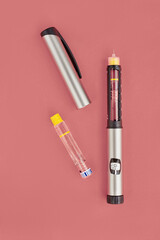 Insulin Pen on collar background, close-up, flat lay. Diabetes control concept