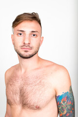 Obraz premium Portrait of bearded man with blond hair shirtless