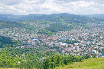 Fototapeta na wymiar Top view of the city in the mountains on Altai Gorno-Altaysk 