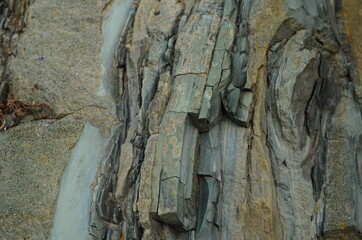 Rock layers - a colorful formations of rocks stacked over the hundreds of years. Interesting background with fascinating texture.