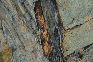 Rock layers - a colorful formations of rocks stacked over the hundreds of years. Interesting background with fascinating texture.