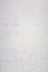 Textured surface of old stone weathered wall in the backyard