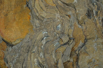 Rock layers - a colorful formations of rocks stacked over the hundreds of years. Interesting background with fascinating texture.