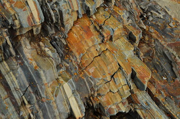 Rock layers - a colorful formations of rocks stacked over the hundreds of years. Interesting background with fascinating texture.