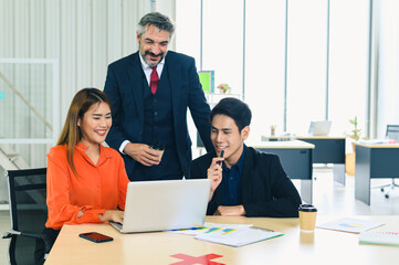 Fototapeta premium Meetings and presentations In a successful company, happy employees