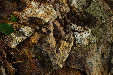 Rock layers - a colorful formations of rocks stacked over the hundreds of years. Interesting background with fascinating texture.