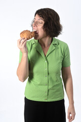 woman with croissant on white background