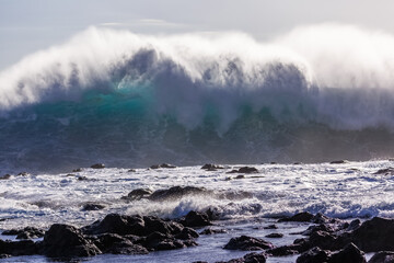 waves crashing on the rocks