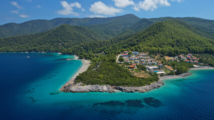 Fototapeta premium Aerial drone panoramic photo of famous turquoise paradise beach of Milia covered with pine trees, Skopelos island, Sporades, Greece