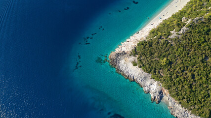 Obraz premium Aerial drone panoramic photo of famous turquoise paradise beach of Milia covered with pine trees, Skopelos island, Sporades, Greece